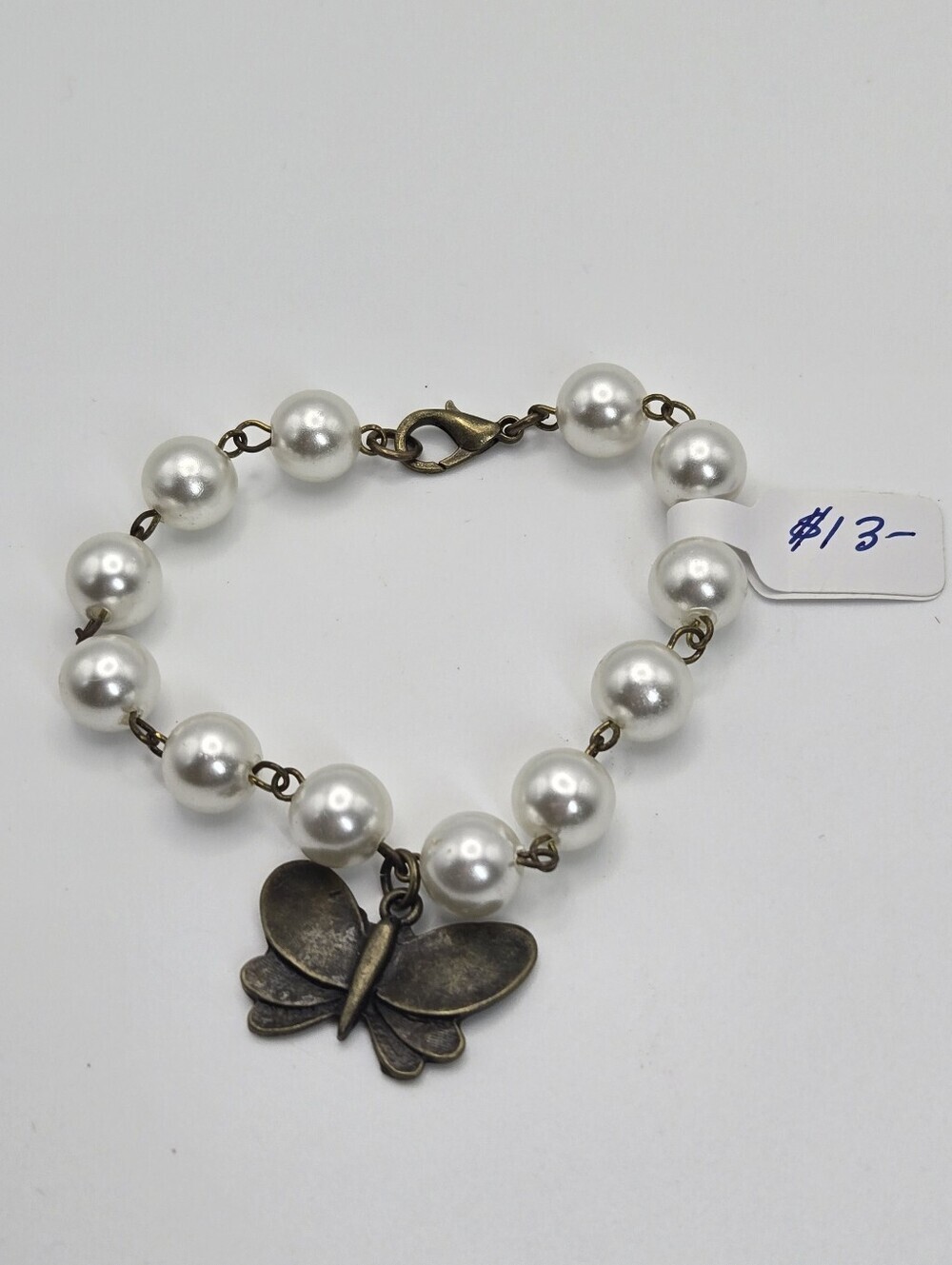 Faux Pearl And Bronze Finnish Moth Charm Bracelet